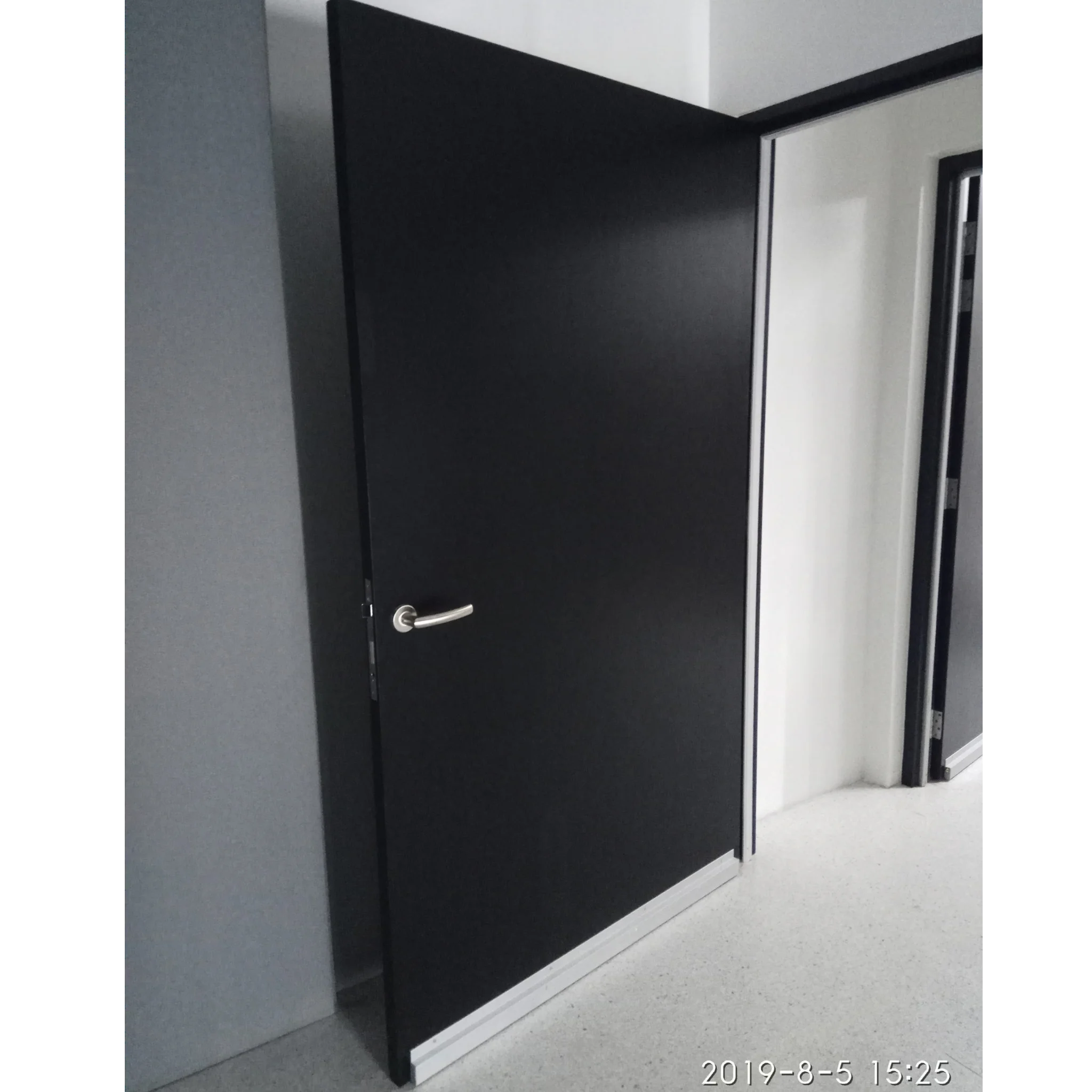 Timber acoustic door installed in a completed project