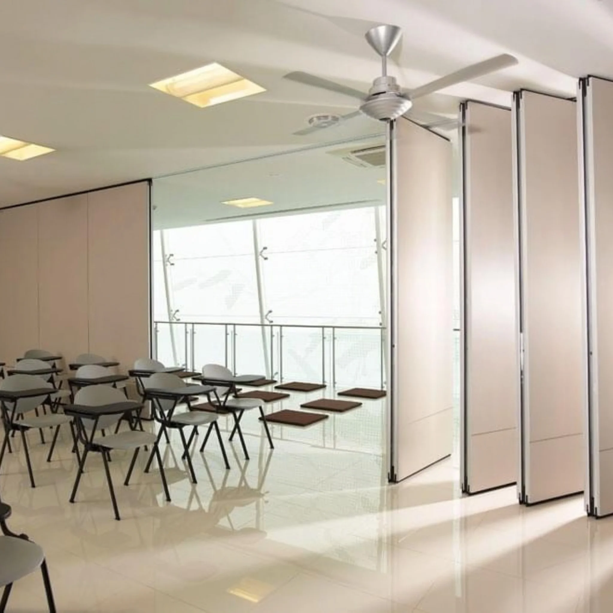 Sliding acoustic room divider system for multi-purpose halls